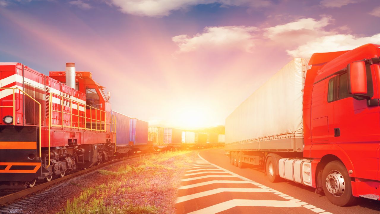 BiCam system for thermographic monitoring Collage of freight train and truck driving side by side